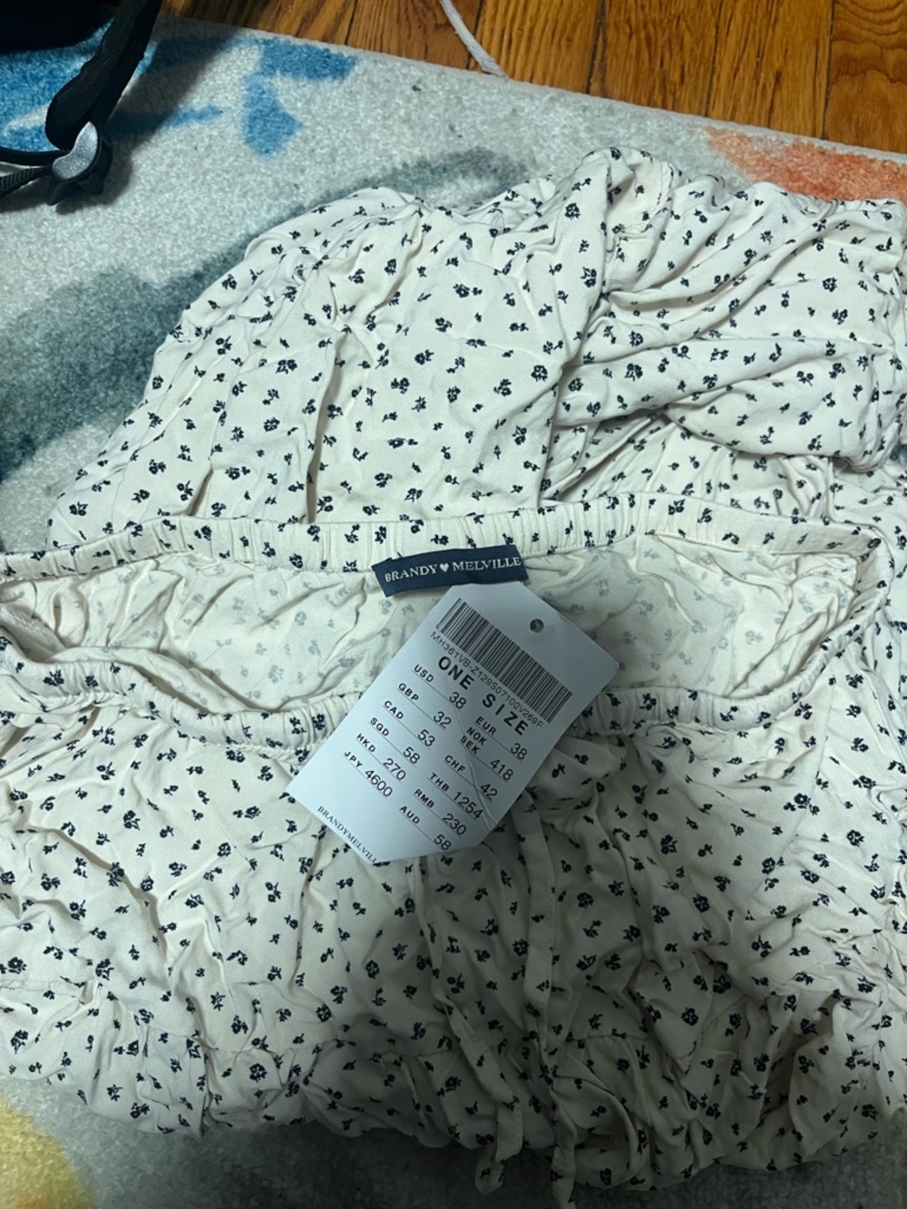 Brandy Melville Cream Floral Smocked Blouse